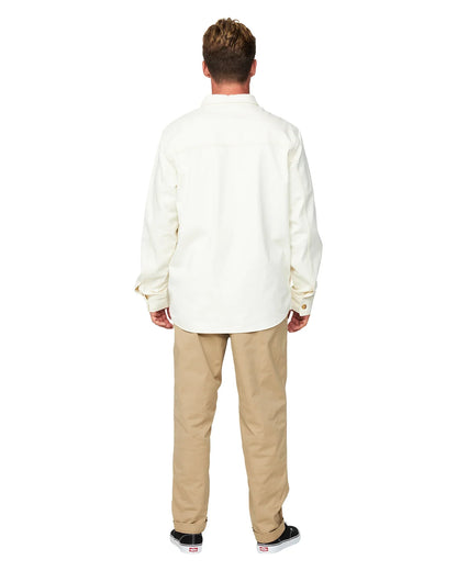 Mens winter jacket in plain white and a beige color pants showing the back view. 