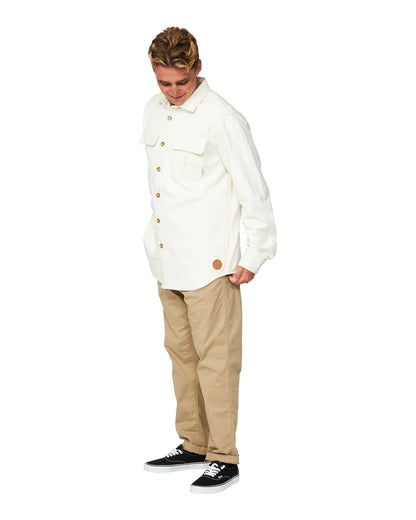 Mens winter jacket in plain white and a beige color pants showing the side view. 