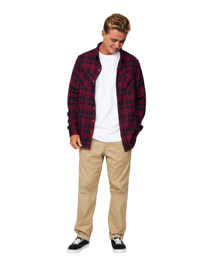 The Okanui Long Sleeve Flannel Hiker Shirt in red/navy color unbuttoned showing the model's white t-shirt.