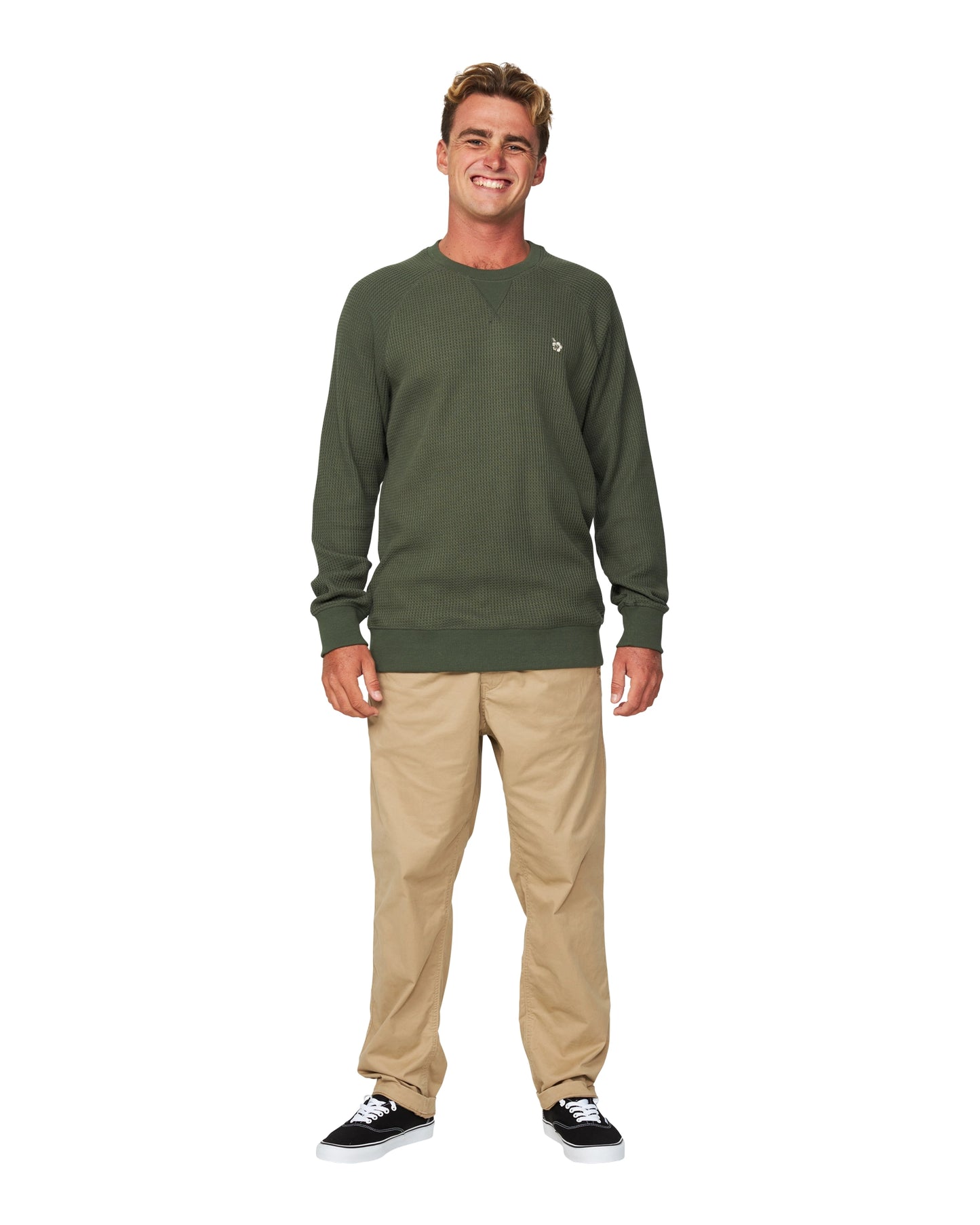 Full body view of a male model wearing the Forrest Green colour Okanui Waffle Jumper Crew.