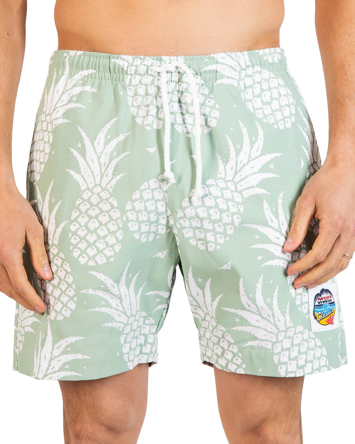 A classic men's short shorts with a white drawstring in the front and two side pockets displayed.