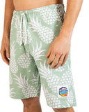 A close-up view of the Okanui Classic Shorts with white pineapple print pattern.