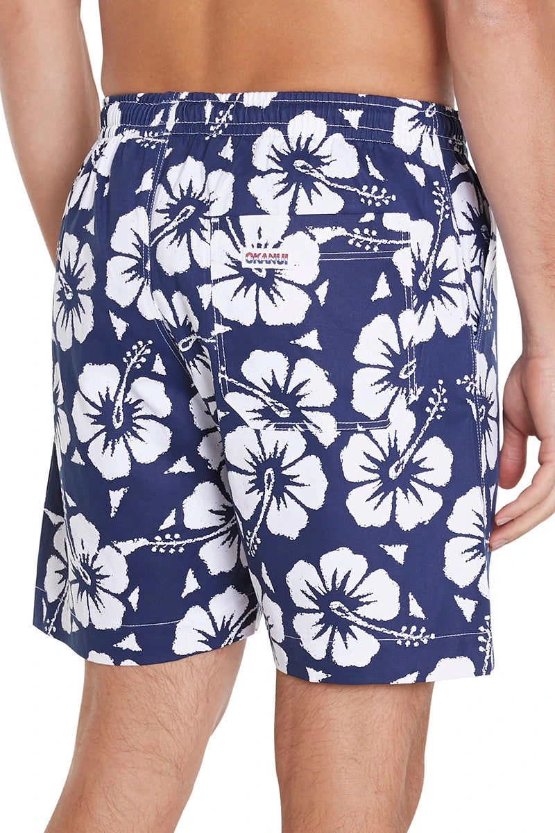 A classic men short shorts with navy and white hibiscus flower showing the back pocket part.