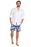A classic mens navy and white hibiscus flower short shorts paired with a plain white top sleeve