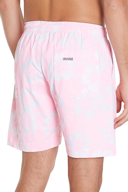 A classic men short shorts with light pink and white hibiscus flower showing the back pocket part and Okanui logo displayed