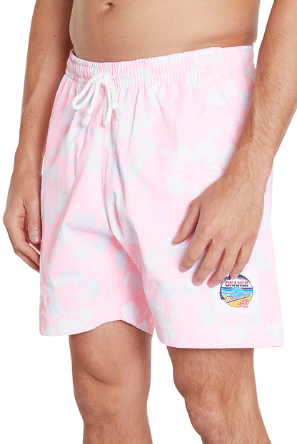 The classic Okanui short shorts with white and light pink hibiscus flower.