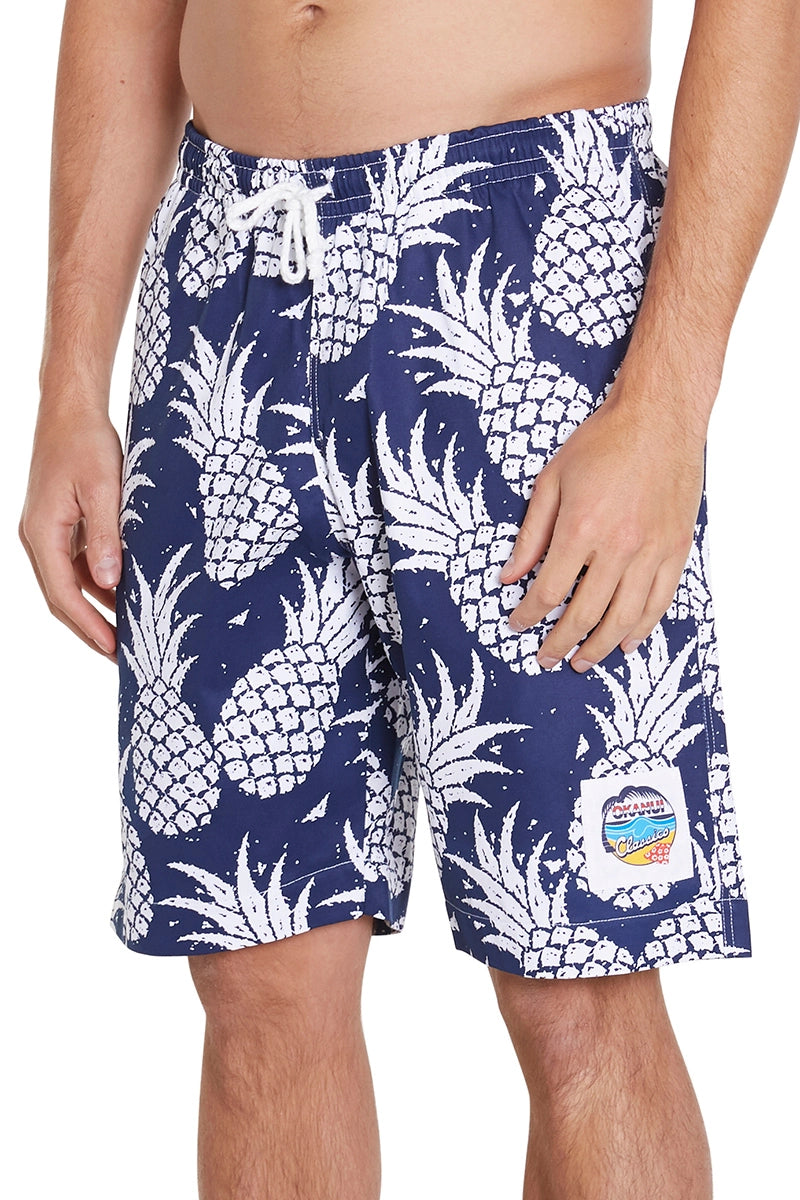 A classic pair of navy shorts with a pineapple pattern.