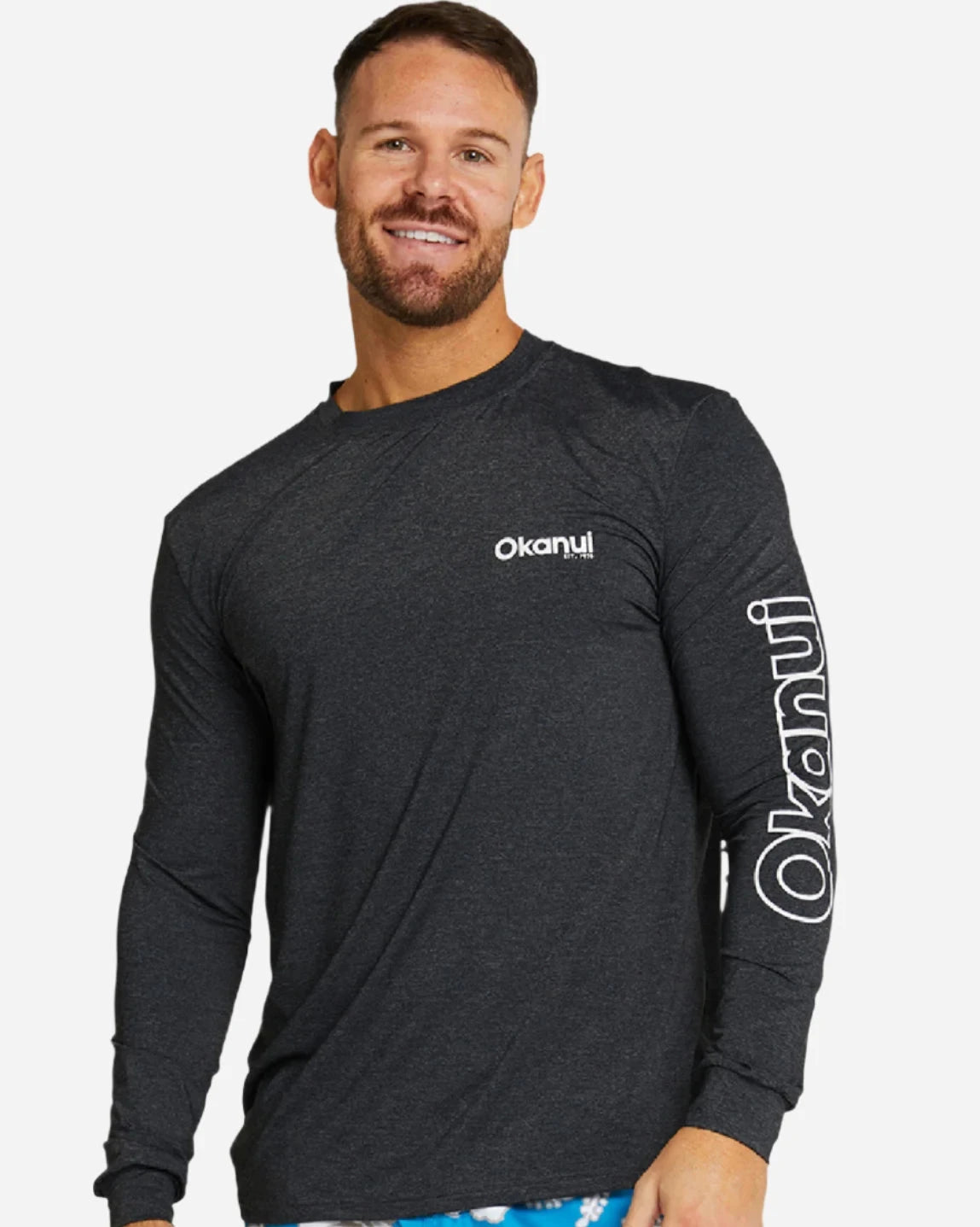 The Okanui Men's spring long sleeve rashie in black marle.