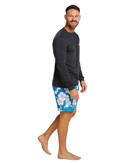 The Okanui Men's spring long sleeve rashie in black marle in left side view. 