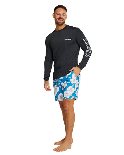 The Okanui Men's spring long sleeve rashie in black marle in right side view.