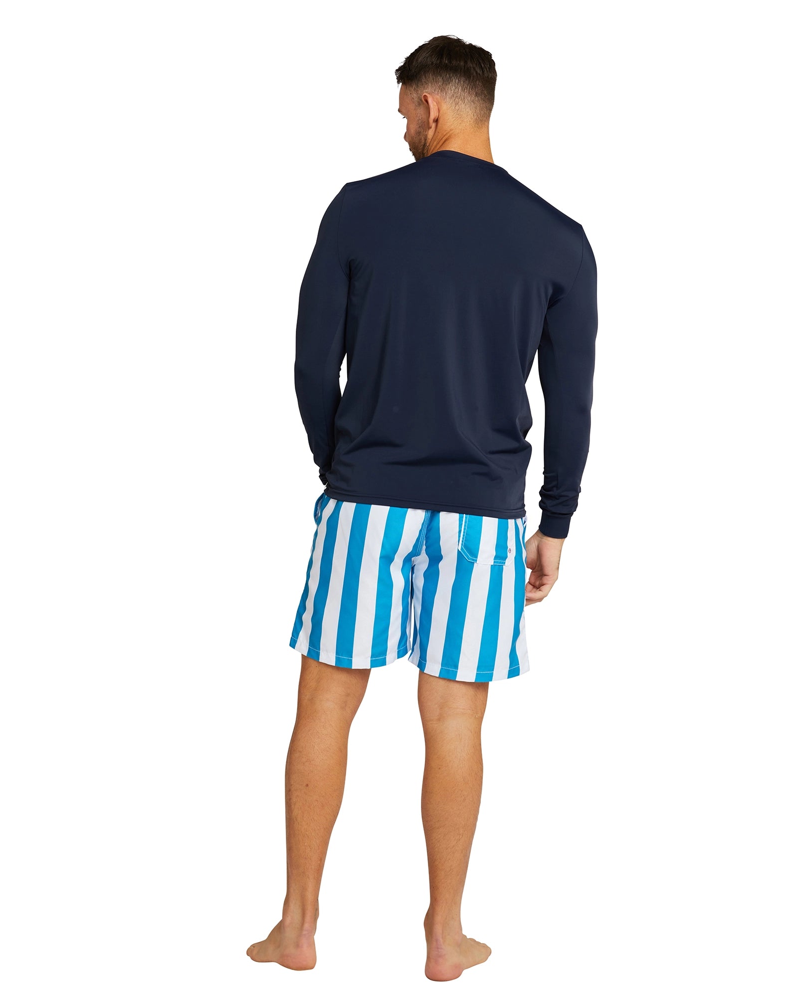 The Okanui Men's Spring Long Sleeve Rashie in navy color showing the back view details. 