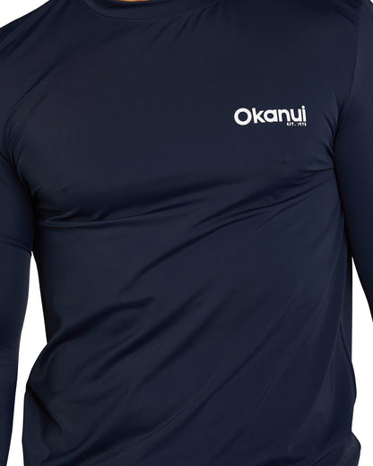 Closer details of Okanui Men's Spring Long Sleeve Rashie in navy. 