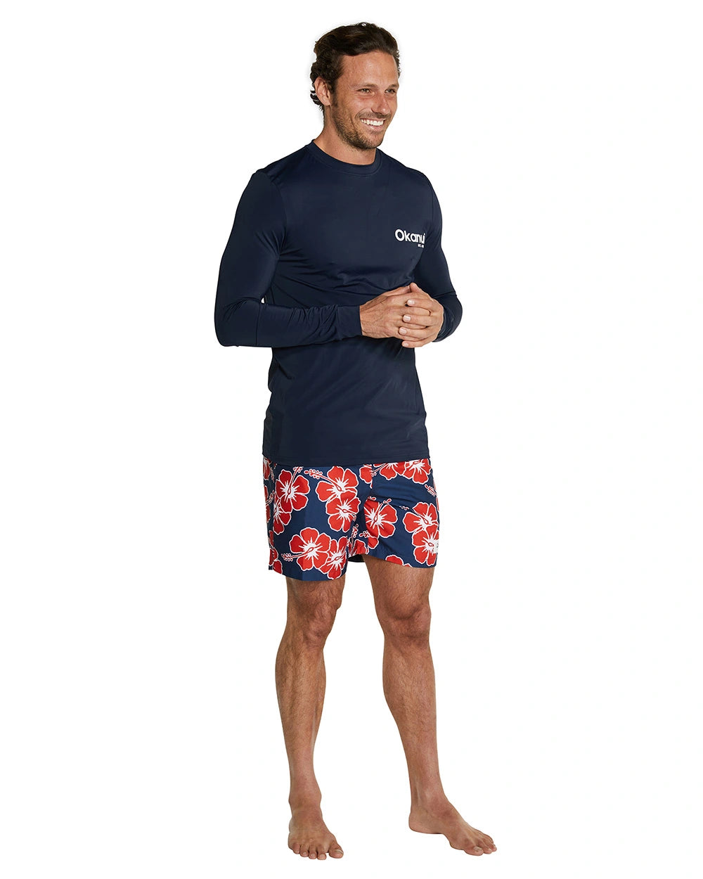 The Okanui Men's Spring Long Sleeve Rashie in navy color showing the left side details.