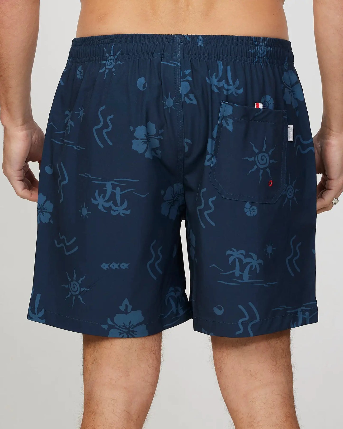 Back view of the Okanui Mens Seascape Stretch Swim Short in Navy Natural