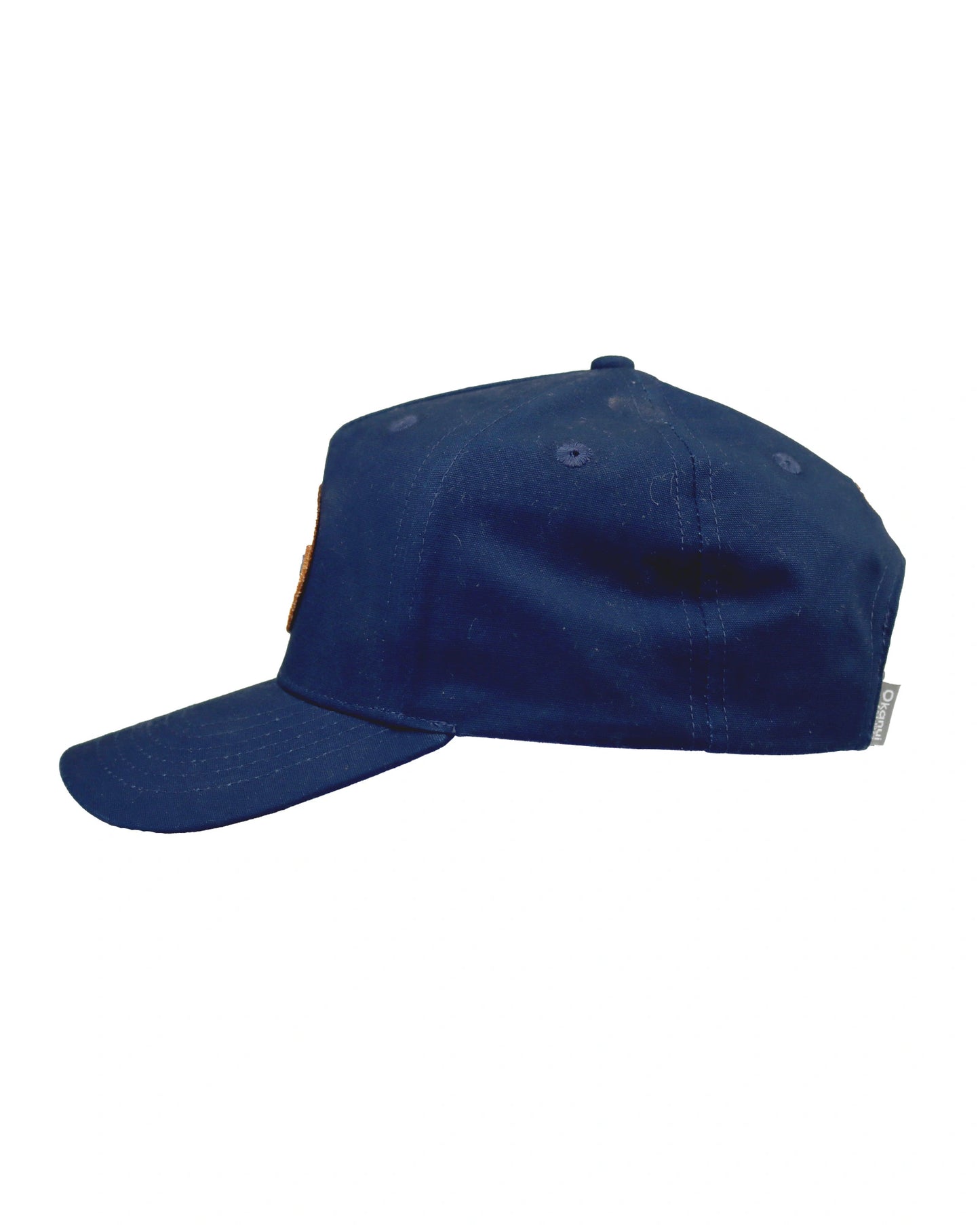 Side View of the Navy Okanui Billboard adult snapback trucker cap