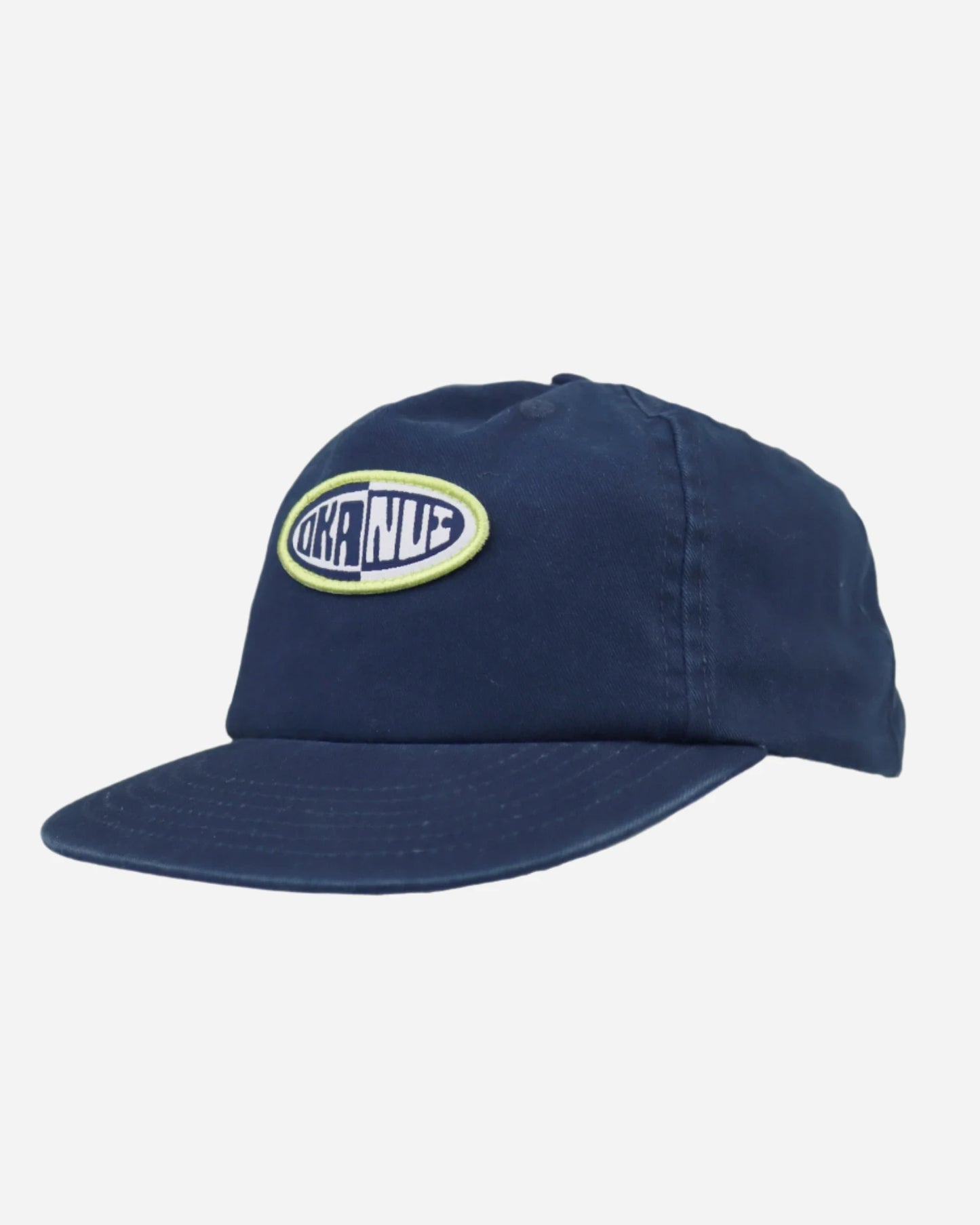 Front view of the Washed Navy Okanui Deck Kids snapback trucker cap