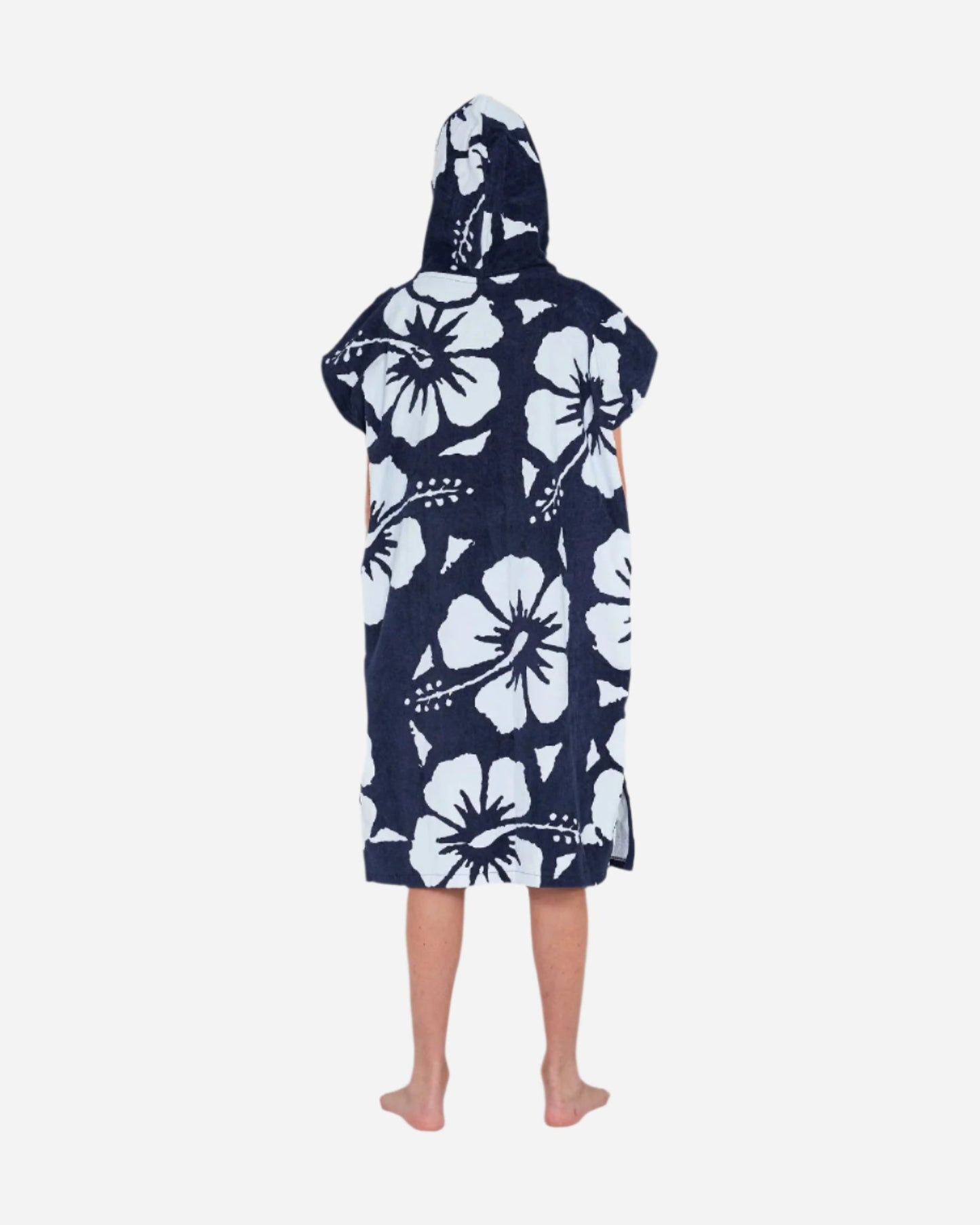 Back view of a kid wearing the Okanui Hooded Towel in Hibiscus Navy color