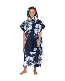 Front view of a girl with its hood on, wearing the Okanui Hooded Towel in Hibiscus Navy color