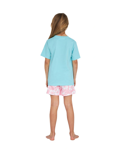 Full body back view of a girl wearing the Okanui Logo Tee T-shirt in Washed Aqua