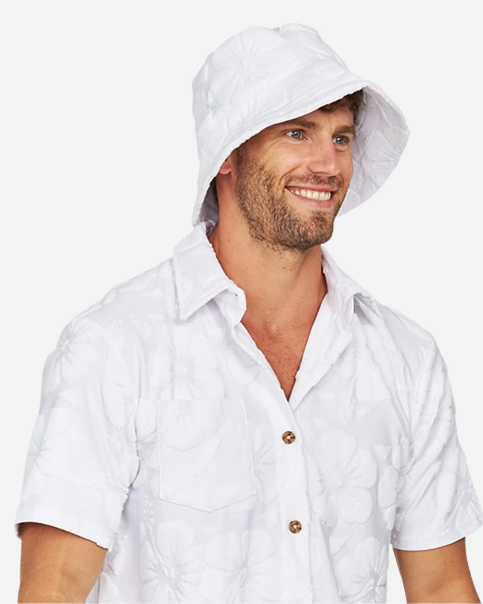 Close up view of a male model wearing the Okanui Weekender Terry Bucket Hat Hibisicus White