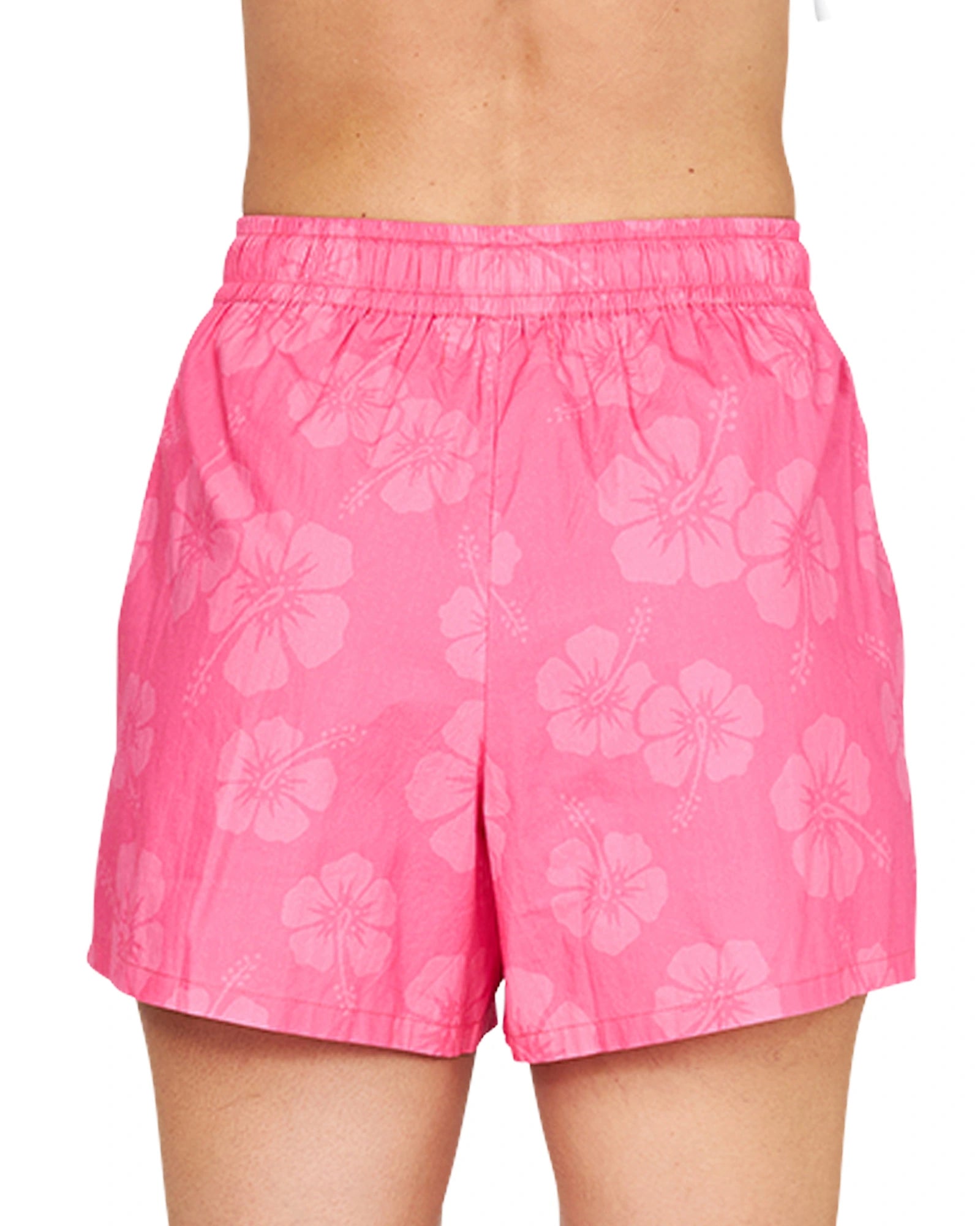 A close up back view of the Okanui Classic Beach Short in Hibiscus Hot Pink.