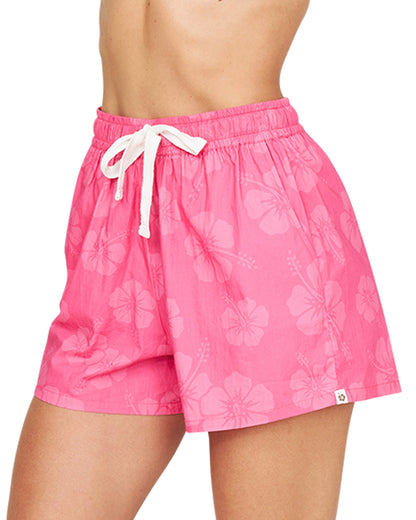 A close up side view of the Okanui Classic Beach Short in Hibiscus Hot Pink.