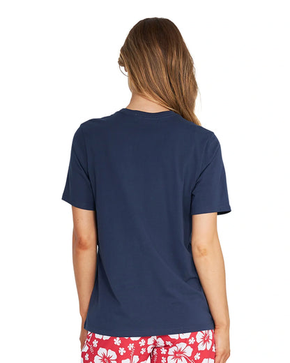 Close up back view of a female model wearing the Okanui Inline cotton T-shirt in Navy color