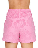 A close up back view of the Okanui Womens Weekender Terry Short in Hibiscus Pink. 