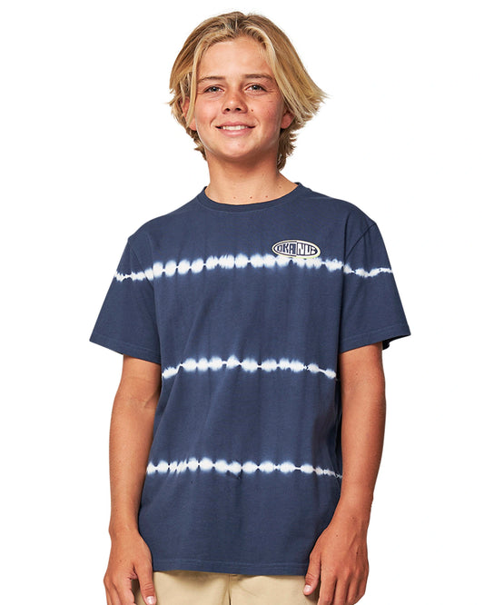 Closeup front view of a boy wearing the Okanui Breaker Tee T-shirt in Navy Stripe