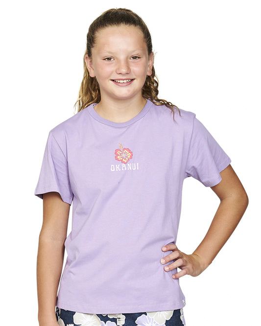 Close up front view of a girl wearing the Okanui Long Days Tee T-shirt in Lilac