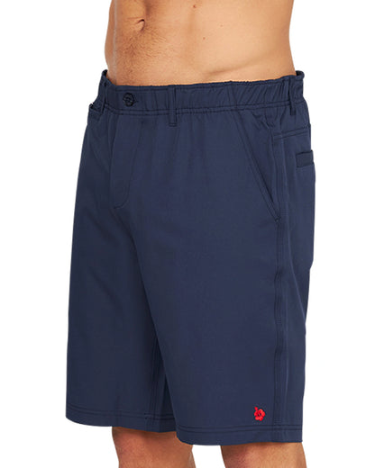 A side view of the Okanui Active Byrd Golf Shorts in navy.