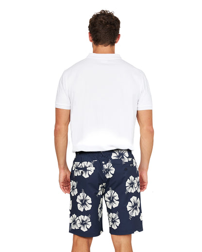 Back view of a male model wearing the Okanui Active Byrd Golf Shorts in navy stone color.