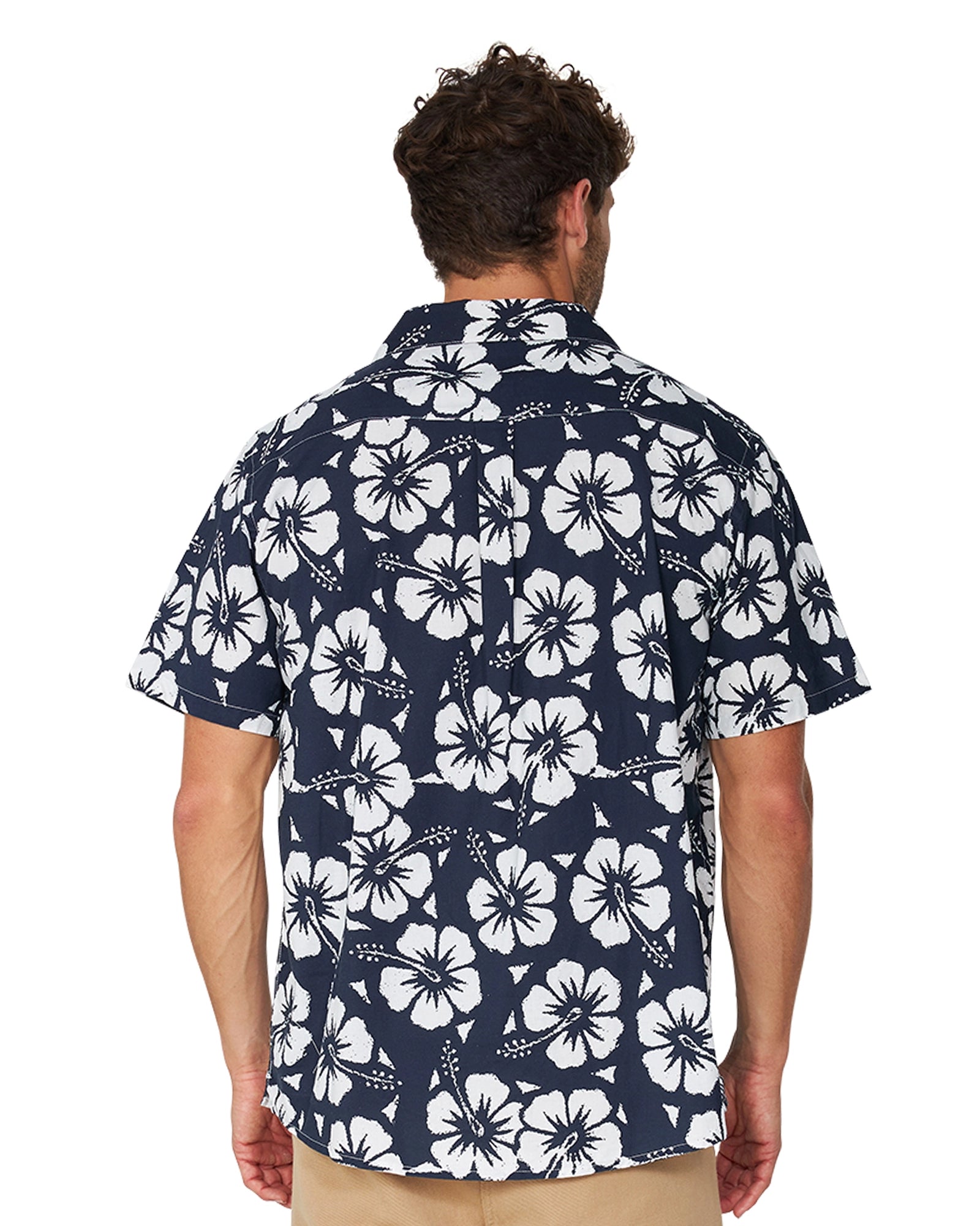 A closer back view at the Okanui Classic Hawaiian Shirt in Hibiscus navy featuring the a white Hibiscus flower print pattern and the main navy blue color.