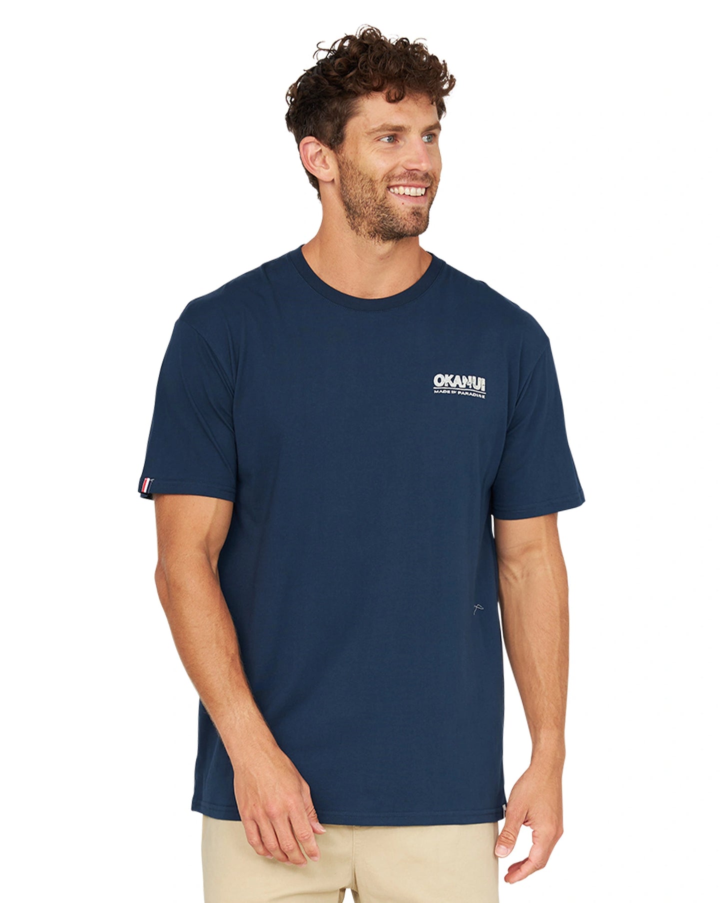 Front view of a male model wearing the Okanui OG Baggies T-Shirt in navy.