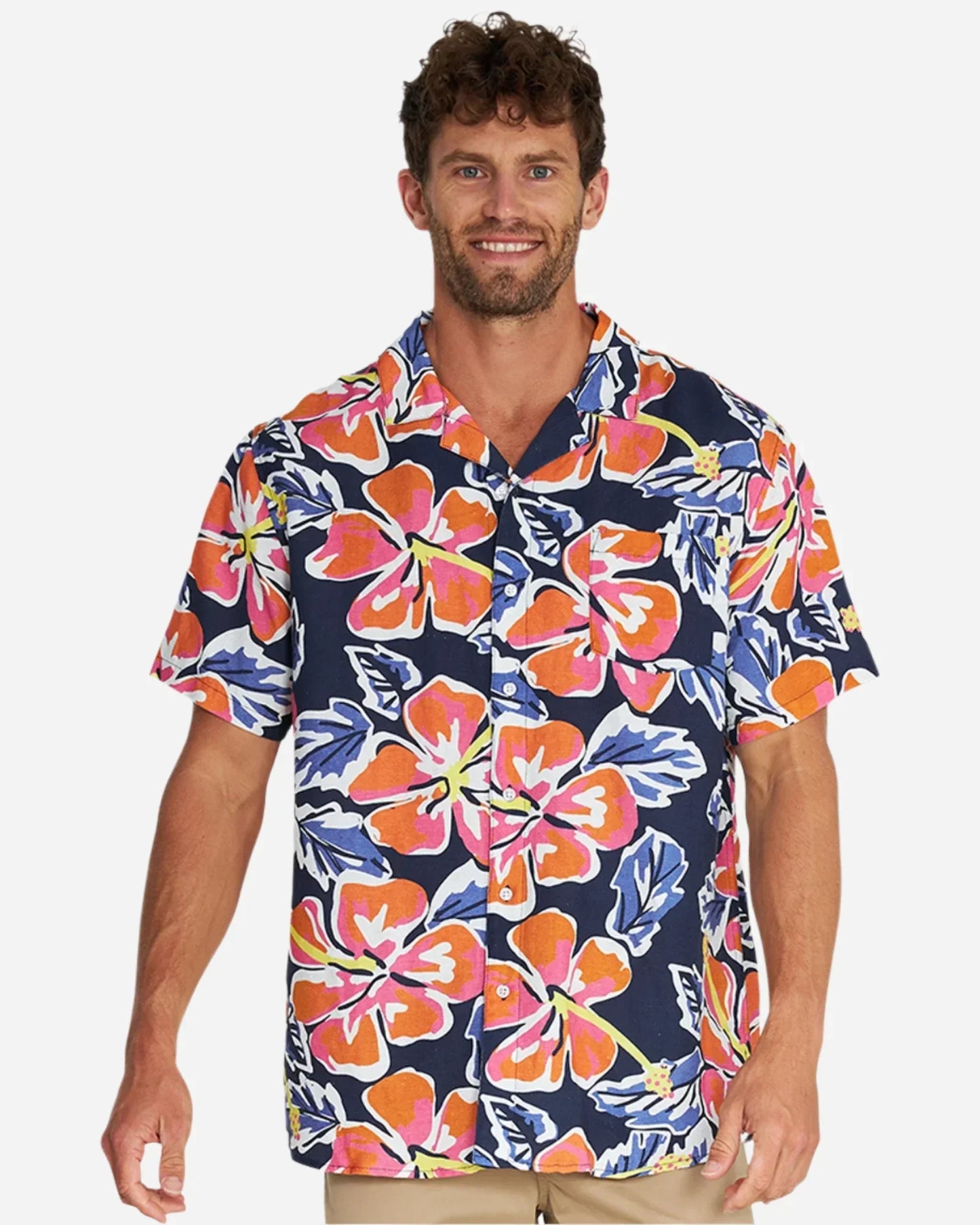 A male model wearing the Okanui Rhapsody Aloha Short Sleeve Shirt in navy multi.