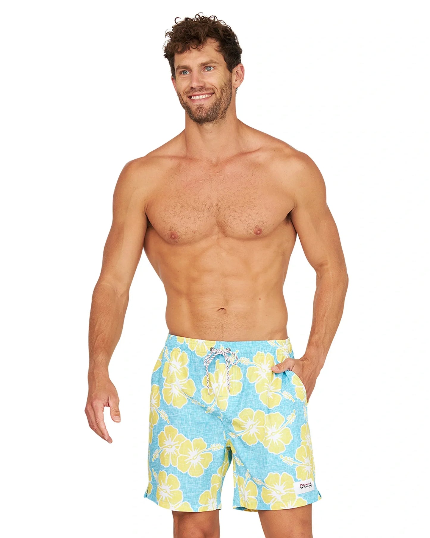 A shirtless male model wearing the Okanui Way Back When Stretch Swim Short in Aqua Yellow.