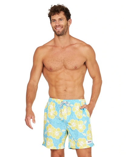 A shirtless male model wearing the Okanui Way Back When Stretch Swim Short in Aqua Yellow.