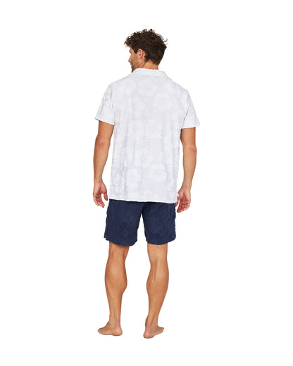 Full body back view of the Okanui Weekend Terry Jacquard Polo in Hibiscus White.