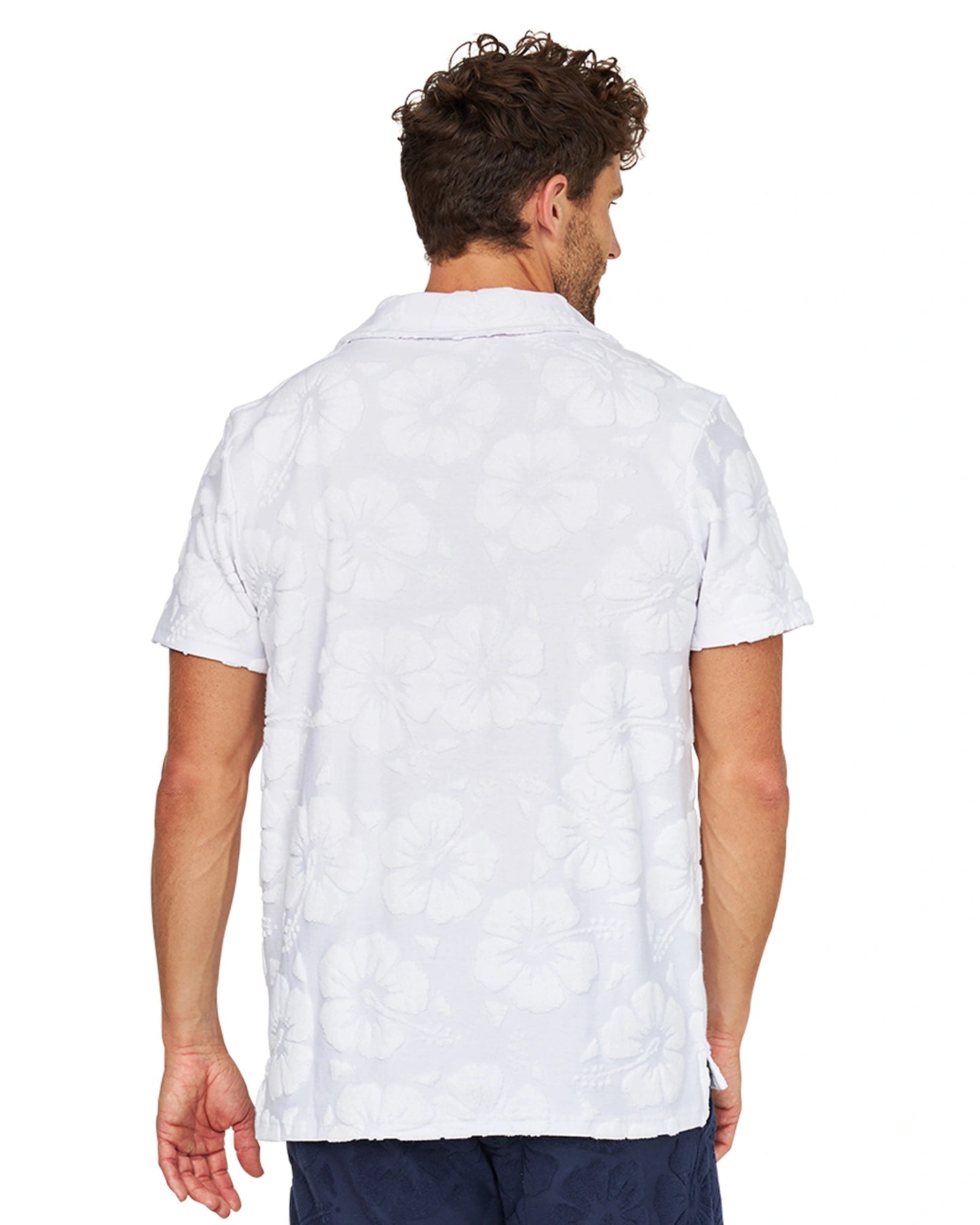 Back view of the Okanui Weekend Terry Jacquard Polo in Hibiscus White.