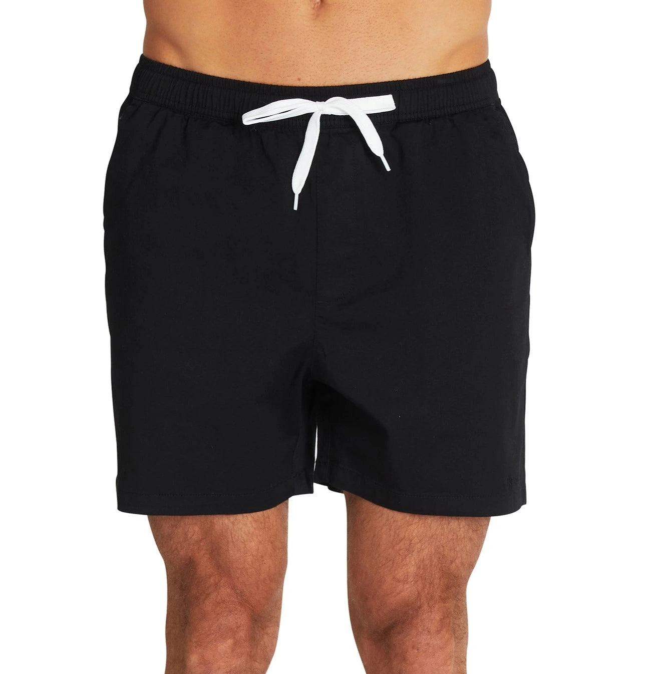 A close up view of the Okanui Walk Shorts in black color showcasing a white drawcord and elastic waist.