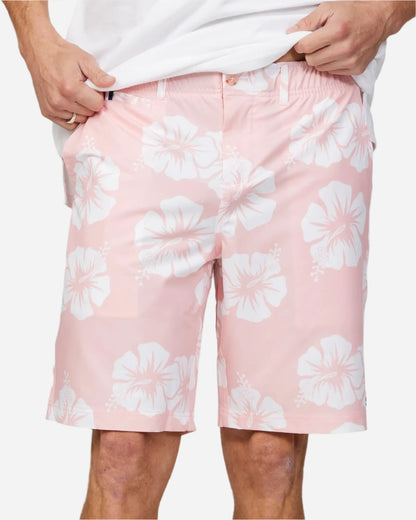 Front view of a male model wearing the Okanui Byrd Active Walk Shorts for Men in OG Pink