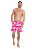 The Okanui classic short short with the pink and white color displays the logo at the bottom and the side.