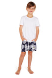 A pair of Okanui kids classic shorts with a white and navy color pineapple patterned.