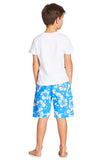A classic kids short with sky blue and white hibiscus flower showing the back part with hands on the pocket side.