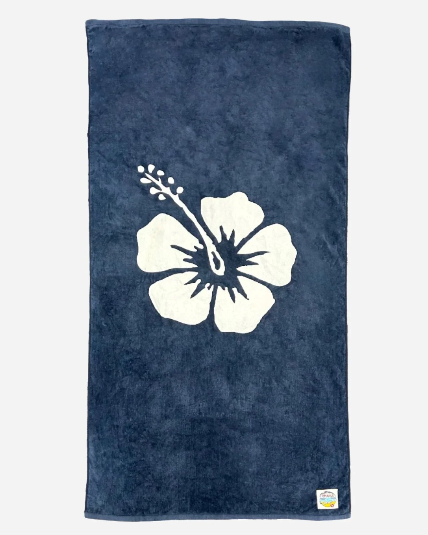 Top view of the Okanui Large Cotton Beach Towel in Hibiscus Print