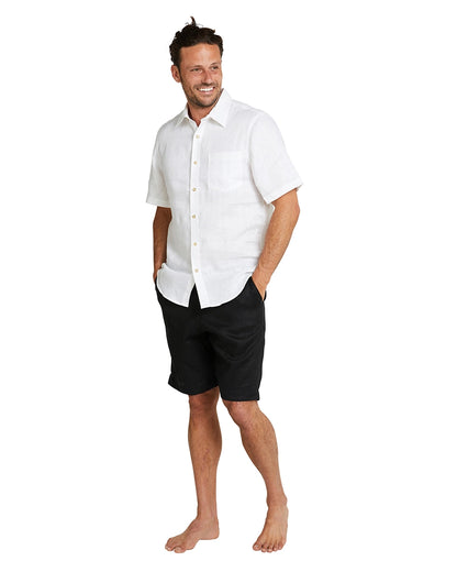 Full body front view of Okanui Linen walking shorts for men paired with a white button up shirt