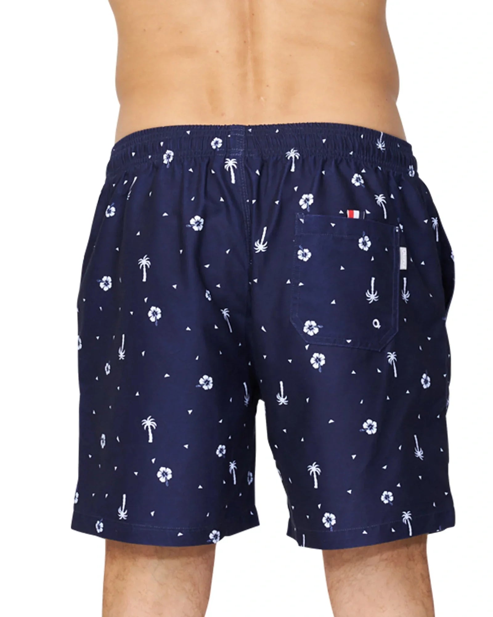 A close up view focusing the back of the Okanui Icons Swimshorts for men in navy colour featuring the single back pocket.