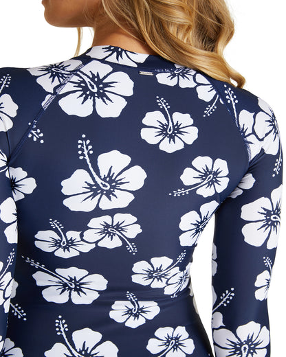 Close view of the Okanui womens long sleeve rash vest in Hibiscus Navy