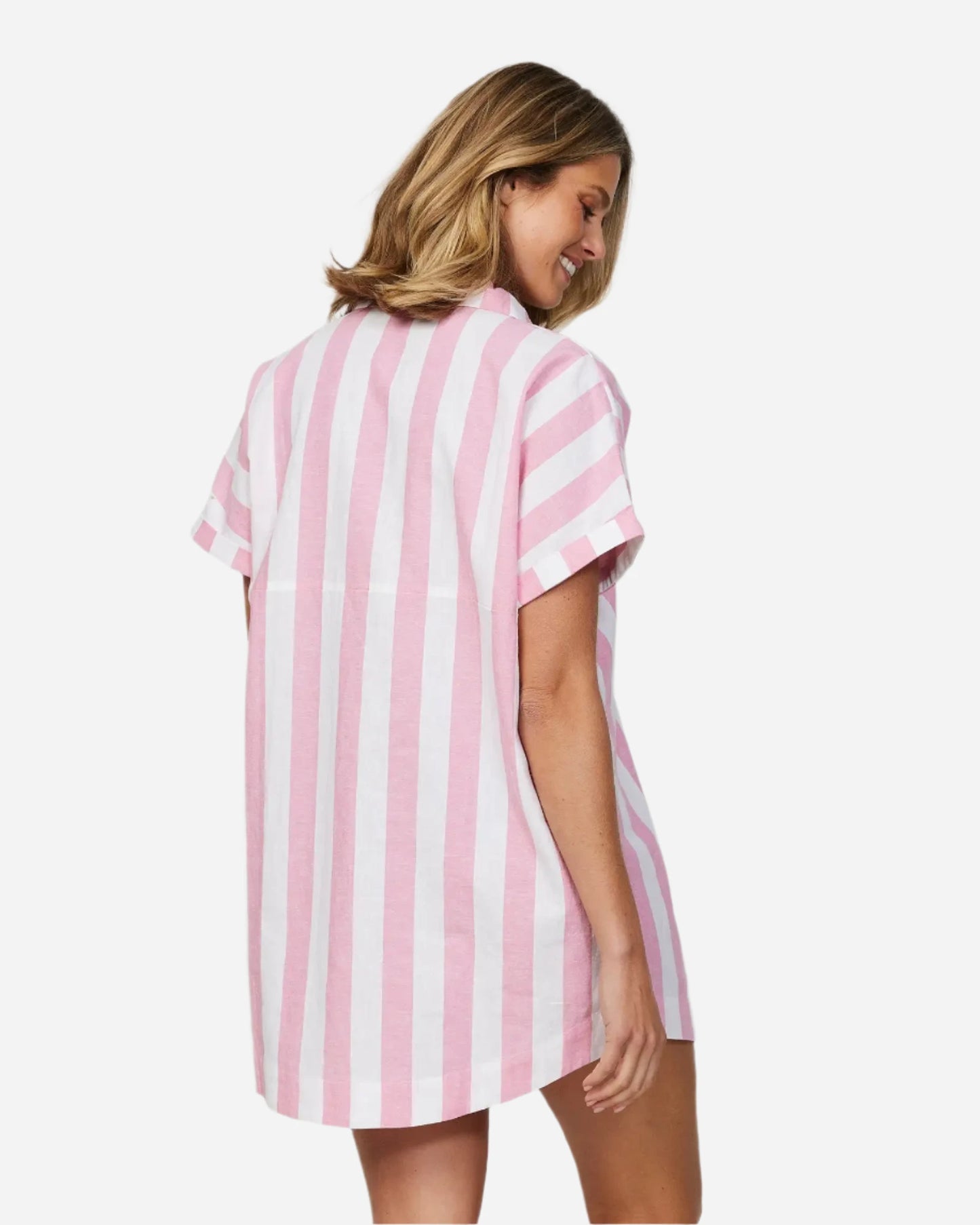 Back view of a female model wearing the Okanui Over Swim featuring a vertical white and pink stripes.