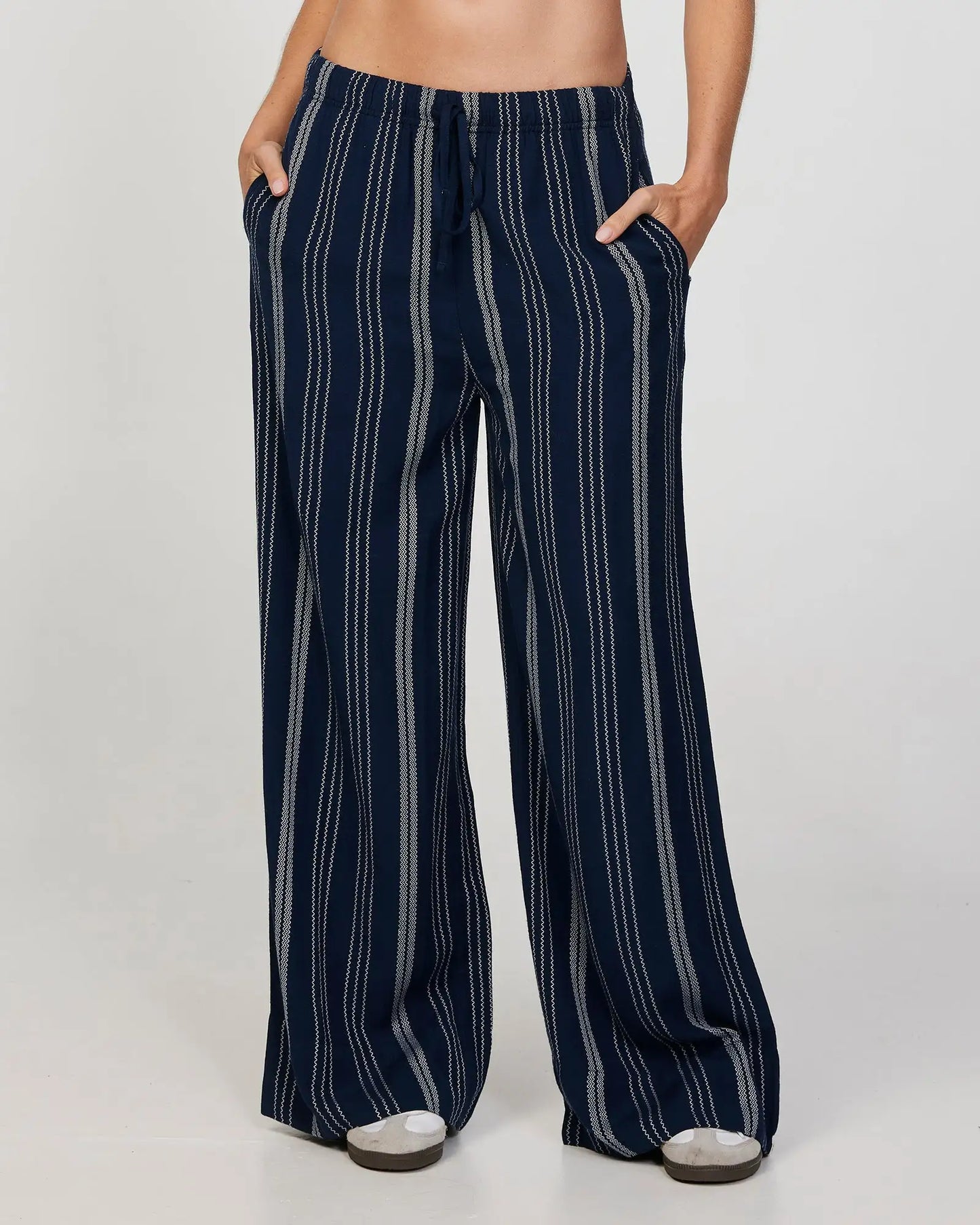 Close front view of the Okanui women's beach pants in navy color.